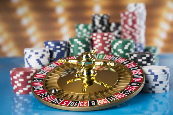 Live Andar Bahar dealer at table with cards placed on left and right sides